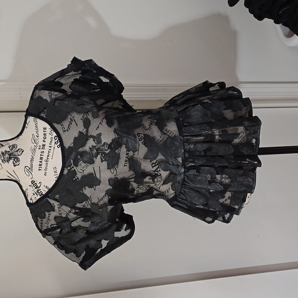 Gracia black faux leather and mesh peplum top